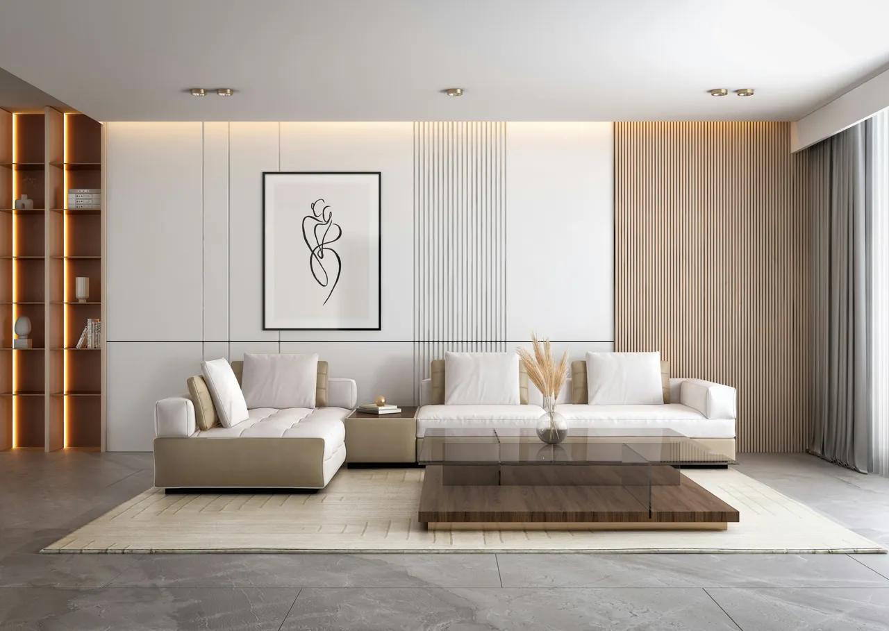 Salon lumineux dont le mur est habillé de panneaux de tasseaux en bois clair, avec un grand canapé blanc et une table basse en bois